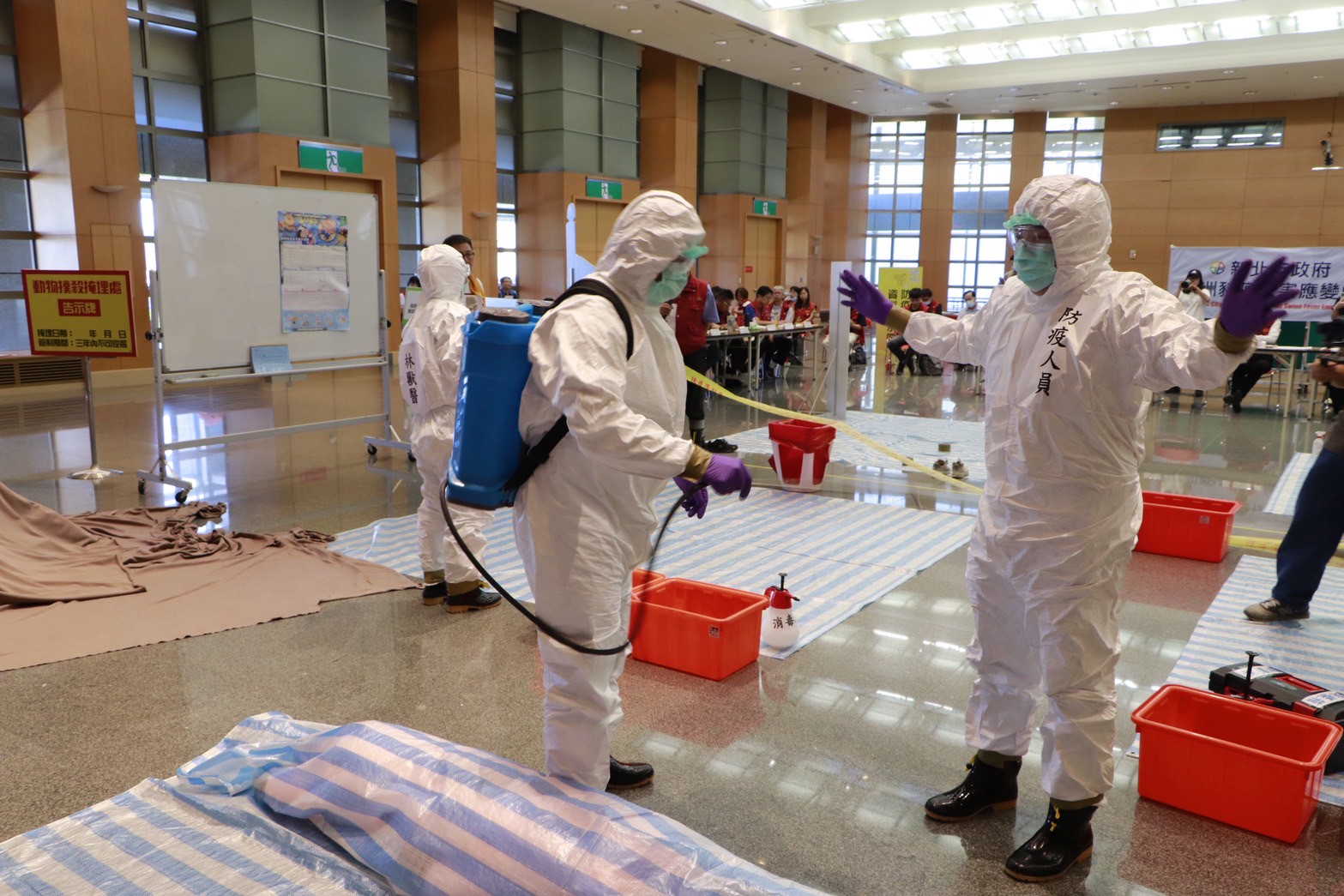 掩理及評價作業人員消毒。.jpg